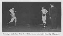 Floyd Wicker crosses home plate
